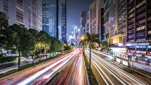laptop with a book and coffee mug