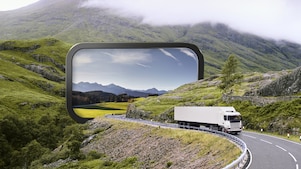 laptop with a book and coffee mug