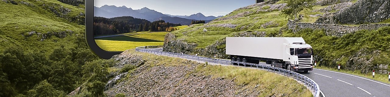 laptop with a book and coffee mug