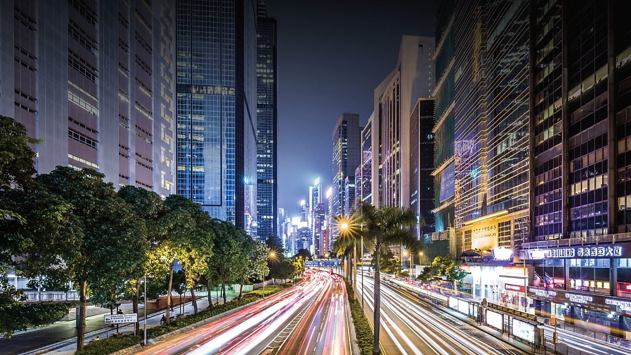 laptop with a book and coffee mug