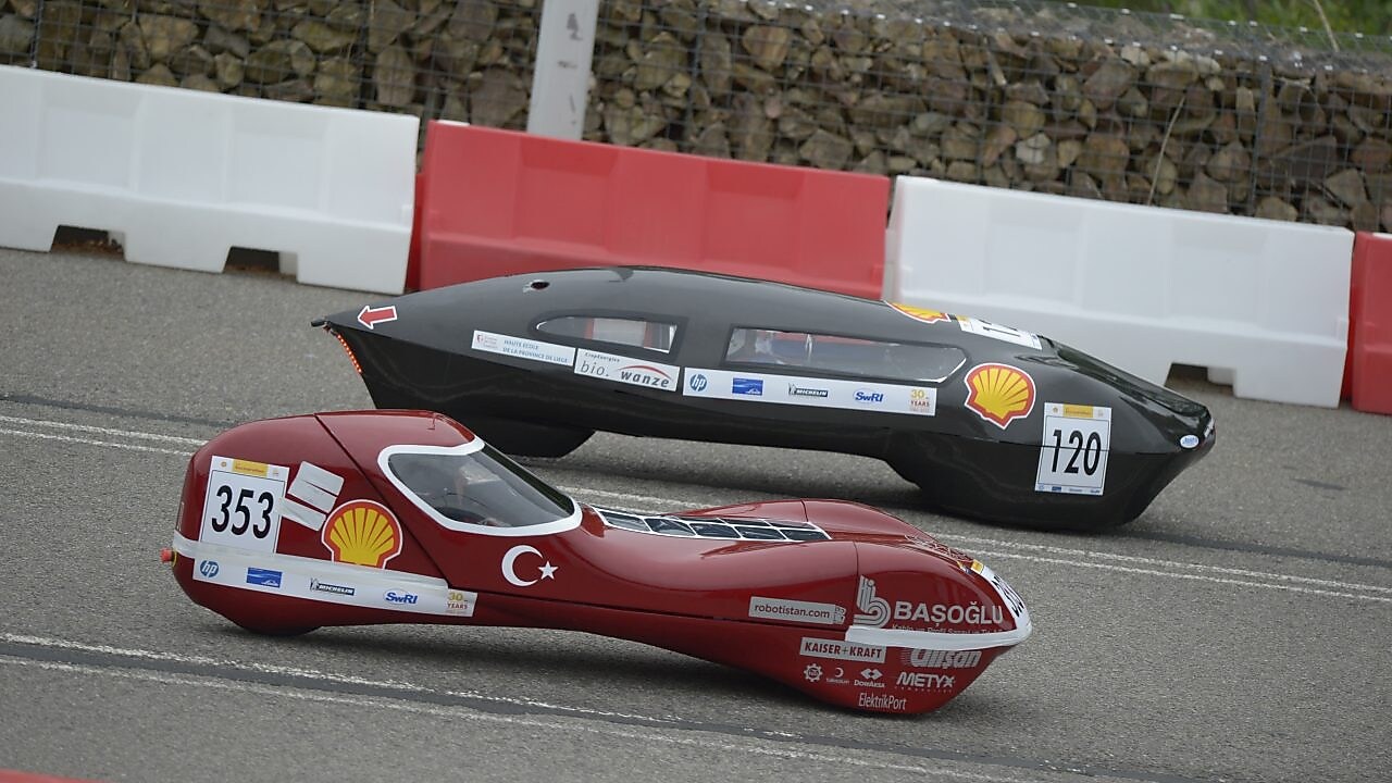two racecars on track