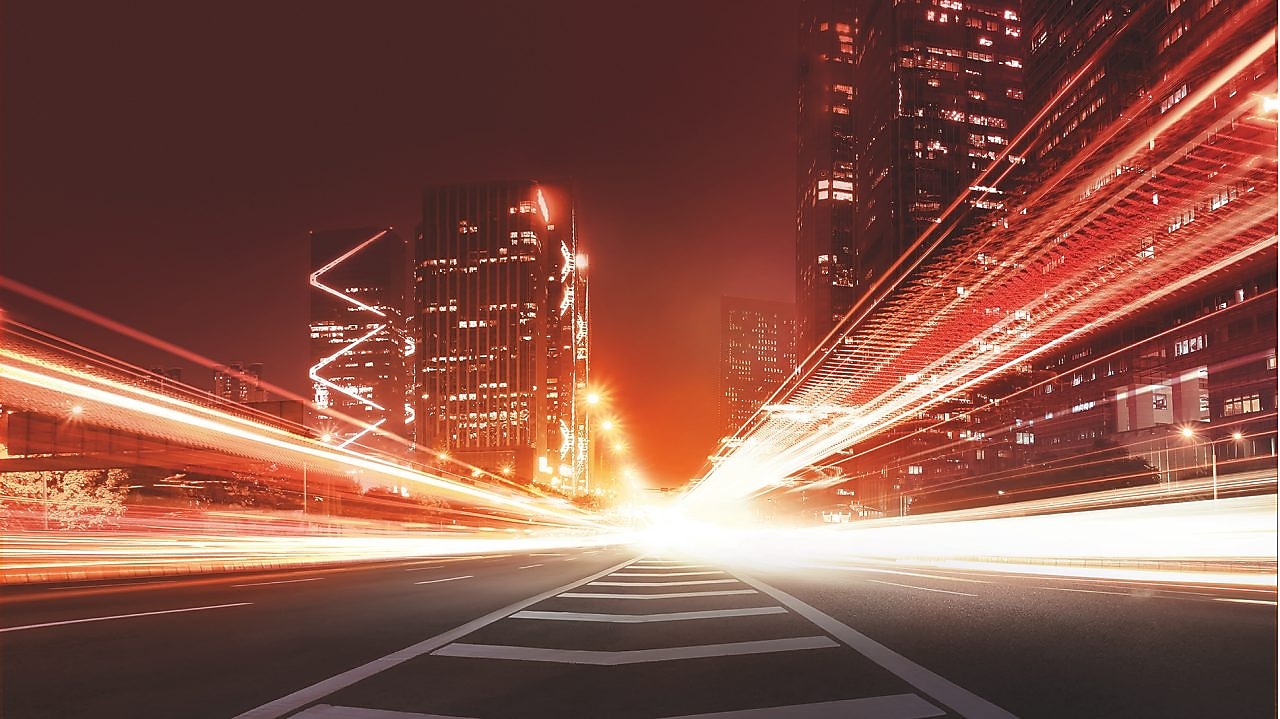 the light trails on the modern building background in china
