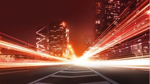the light trails on the modern building background in china