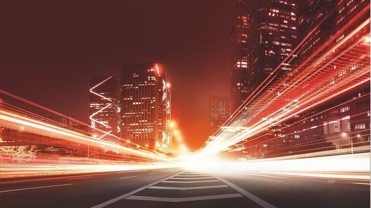 the light trails on the modern building background in china