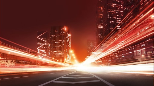 the light trails on the modern building background in china