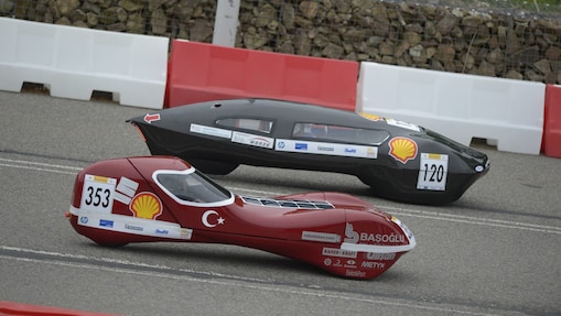 two racecars on track